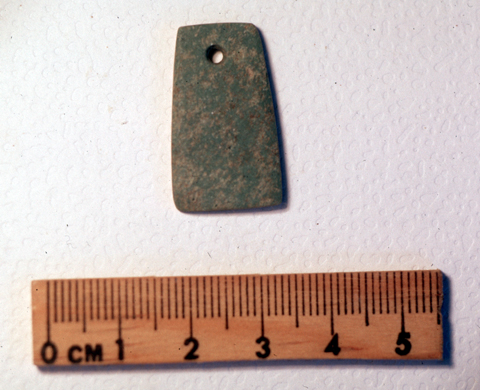 Dije de piedra verde